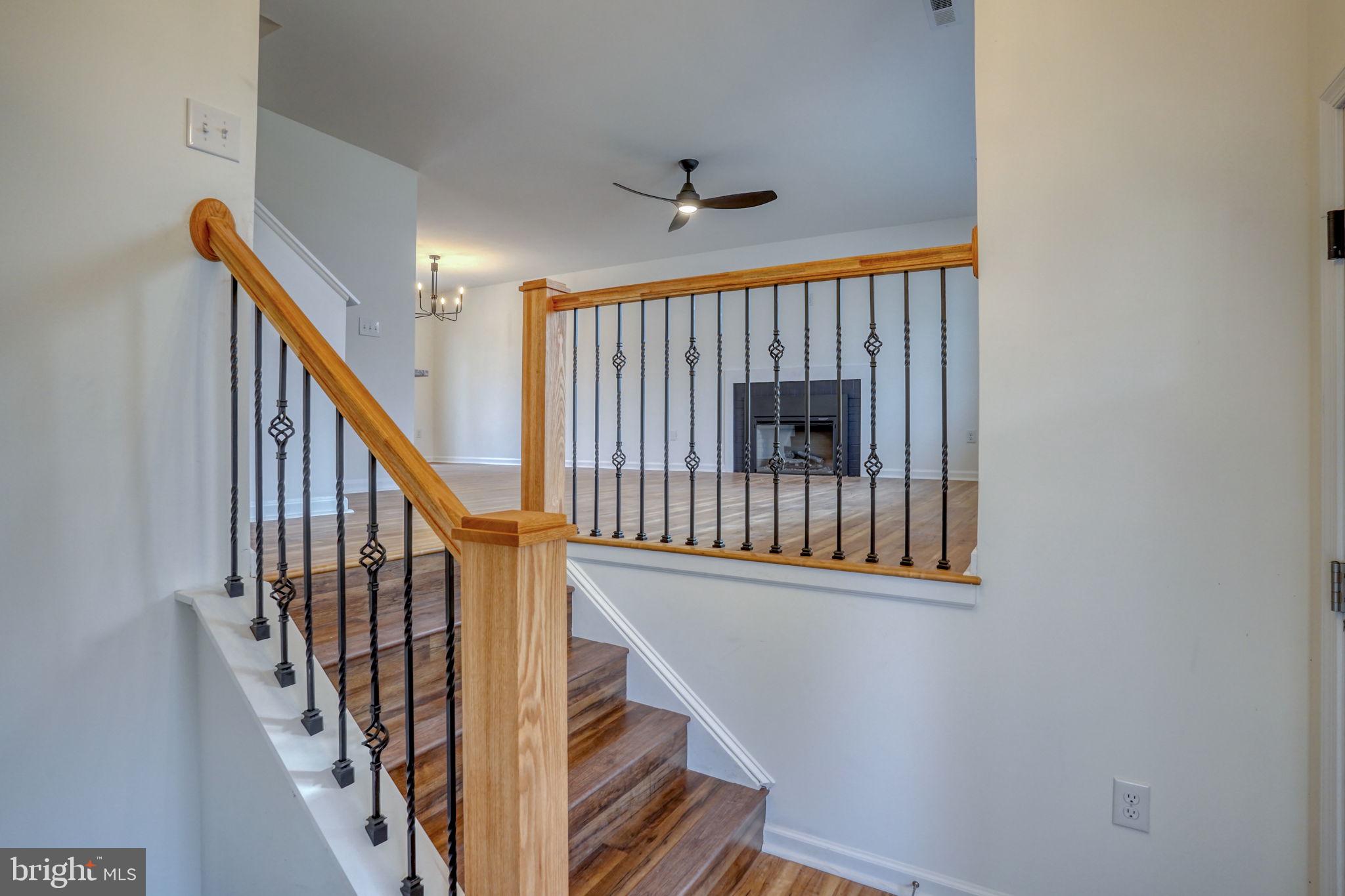 811 Sunset Terrace Dover, DE 19904 - Photo 5 of 45 a view of staircase with railing and white walls