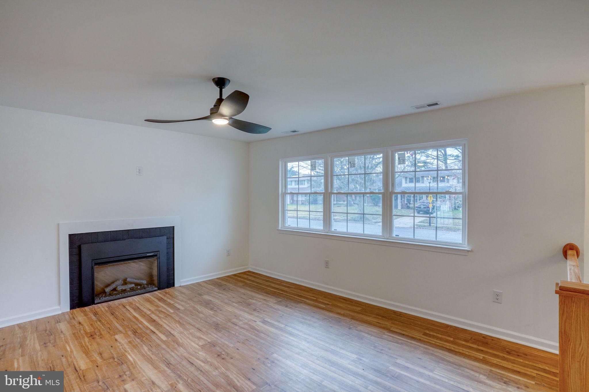 811 Sunset Terrace Dover, DE 19904 - Photo 7 of 45 a bedroom with a bed and a window