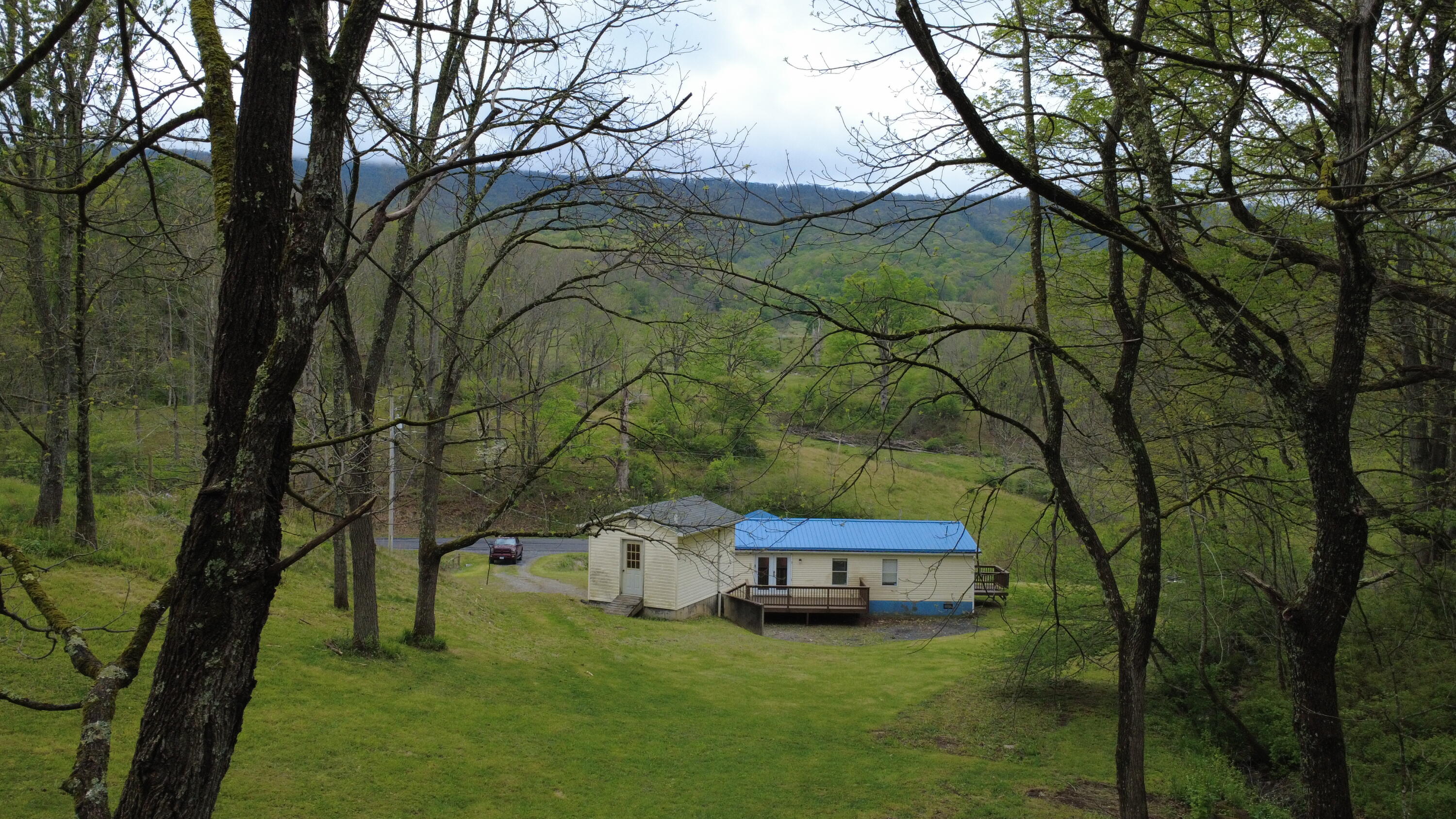 2468 Vly Ctr Road Monterey, VA 24465 - Photo 8 of 28 rear from wooded area