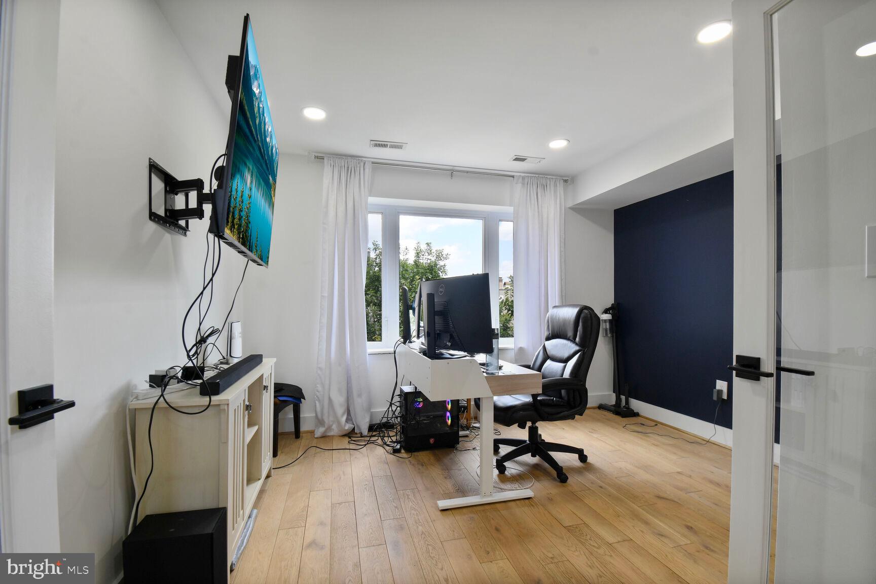 1427 K Street Southeast Washington, DC 20003 - Photo 22 of 30 a view of a room with gym equipment