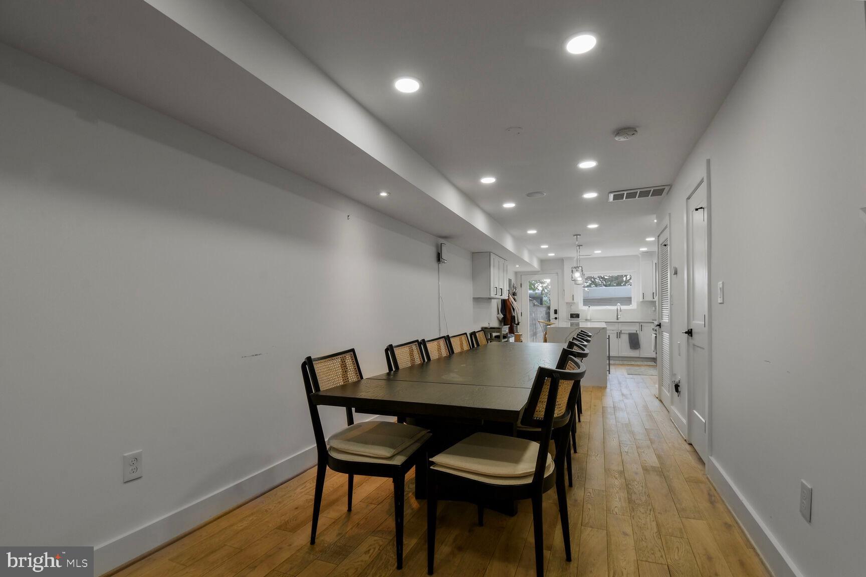 1427 K Street Southeast Washington, DC 20003 - Photo 5 of 30 a dining room with furniture and wooden floor