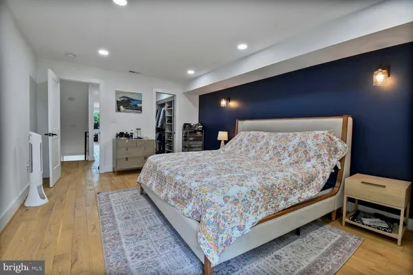 a bed room with a bed and a couch