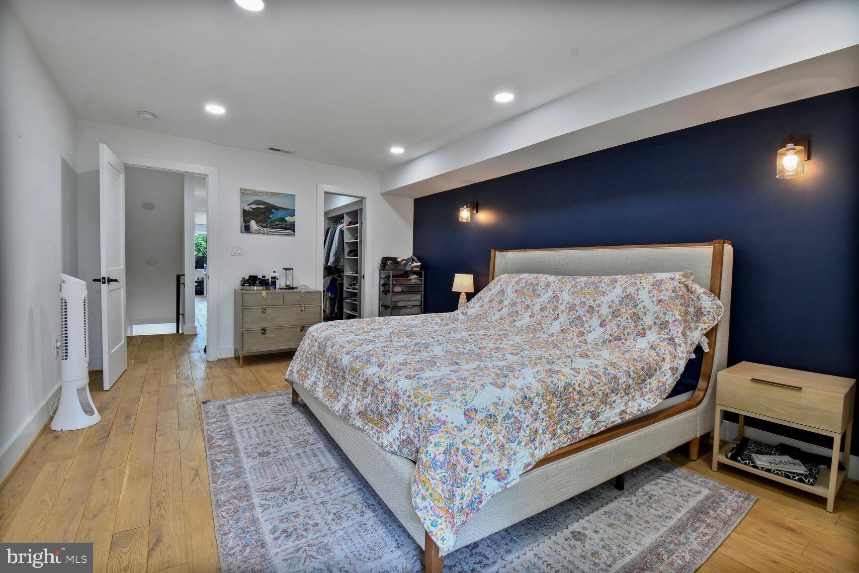 1427 K Street Southeast Washington, DC 20003 - Photo 9 of 30 a bed room with a bed and a couch