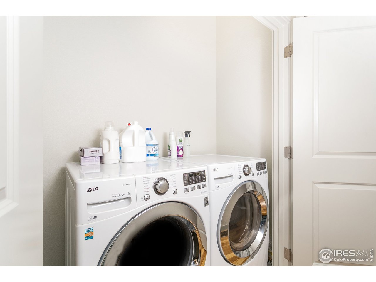 1925 Hooker Street Denver, CO 80204 - Photo 23 of 31 a utility room with dryer and washer