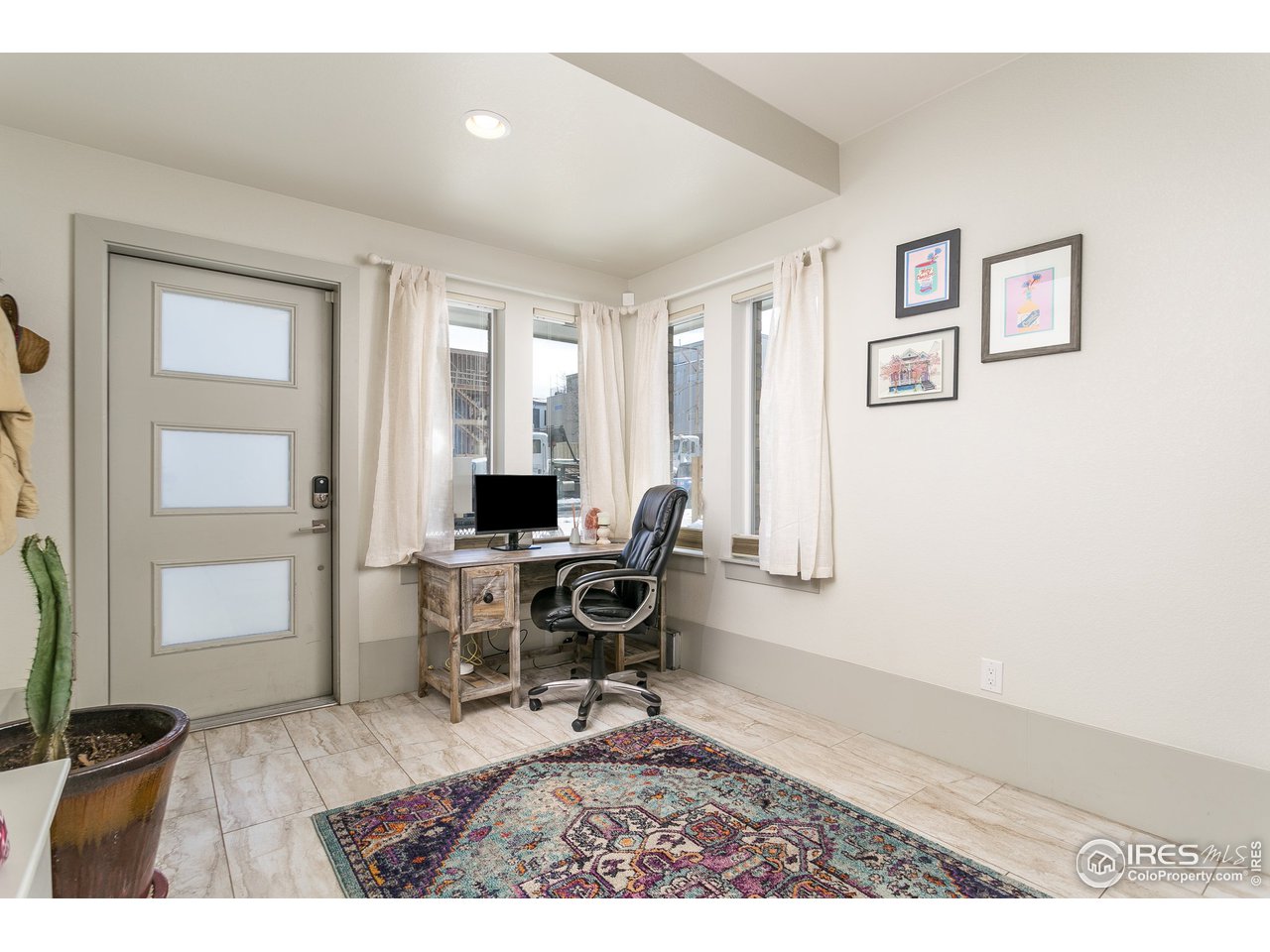 1925 Hooker Street Denver, CO 80204 - Photo 4 of 31 a workspace with furniture and window