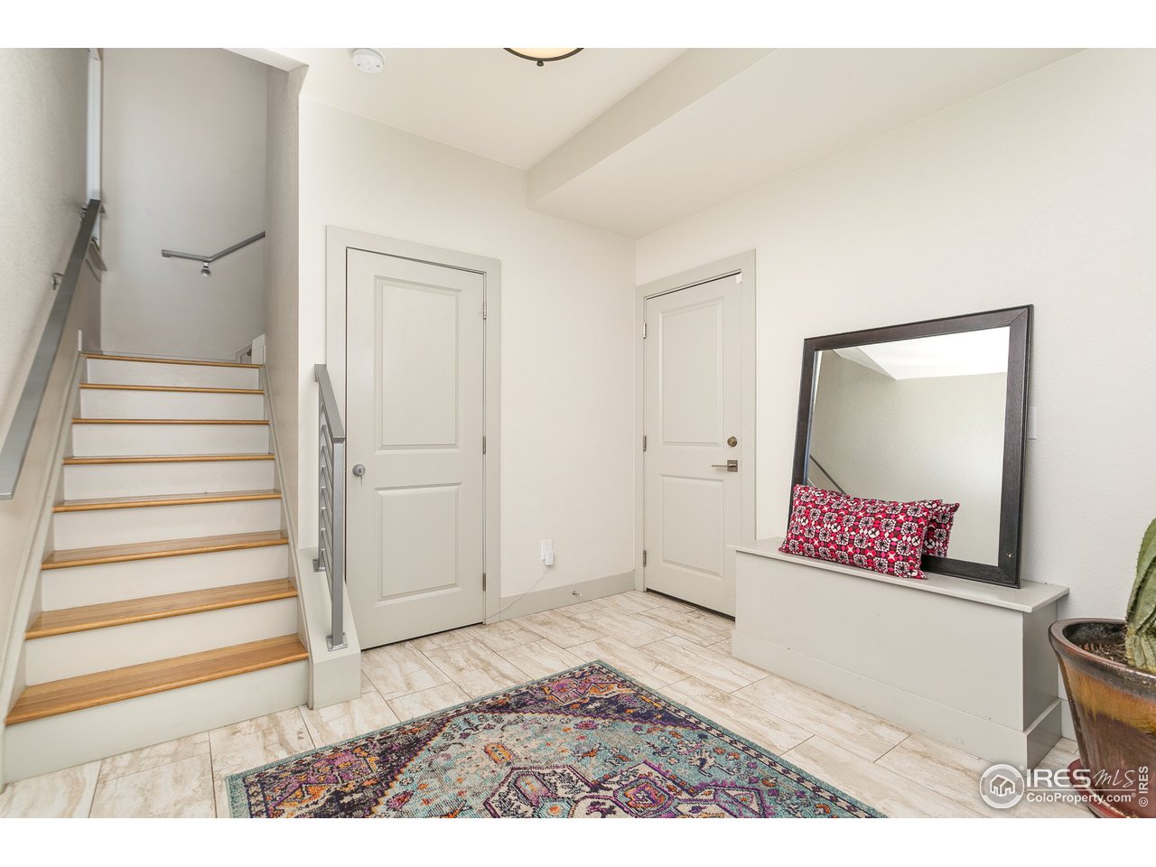 1925 Hooker Street Denver, CO 80204 - Photo 5 of 31 a view of an entryway with wooden floor