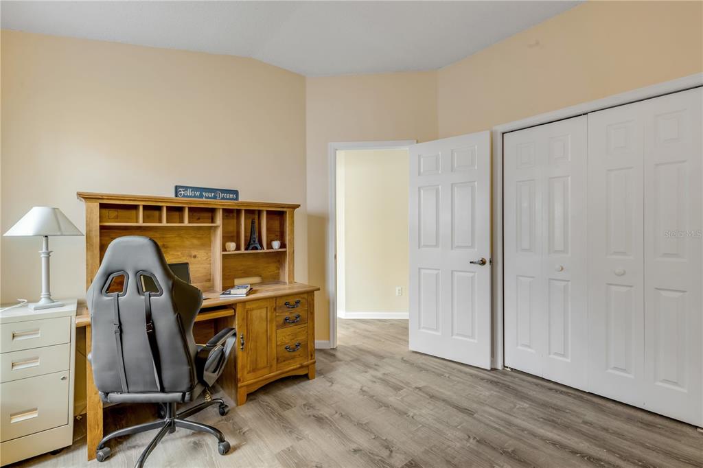 12232 Bronson Way Orlando, FL 32824 - Photo 16 of 32 a view of a room with gym equipment