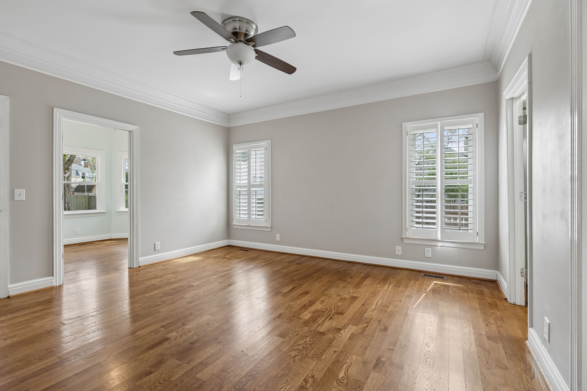 230 Harding Place Nashville, TN 37205 - Photo 25 of 54 a view of empty room with wooden floor and fan
