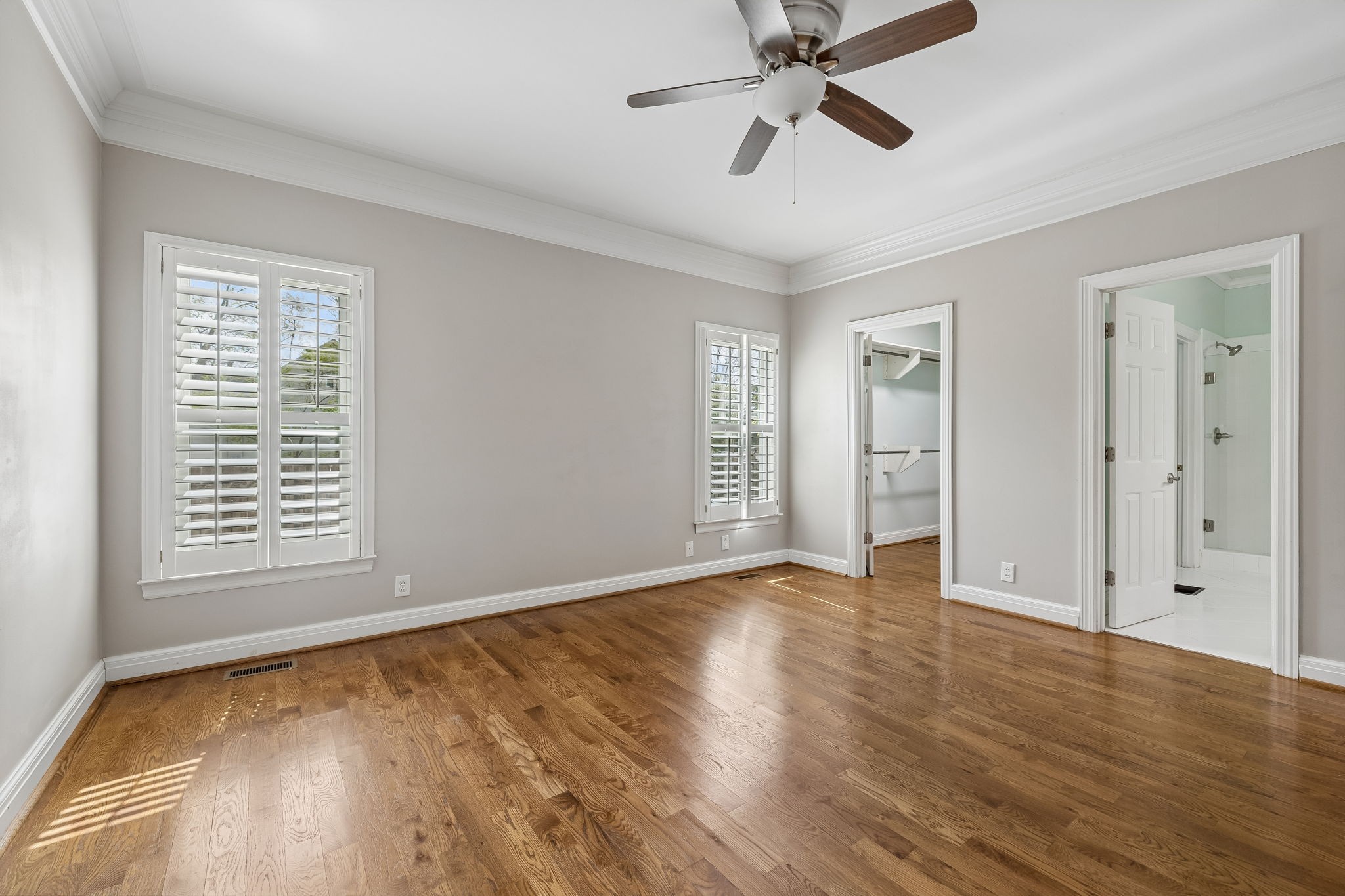 230 Harding Place Nashville, TN 37205 - Photo 27 of 54 a view of an empty room with a window and wooden floor