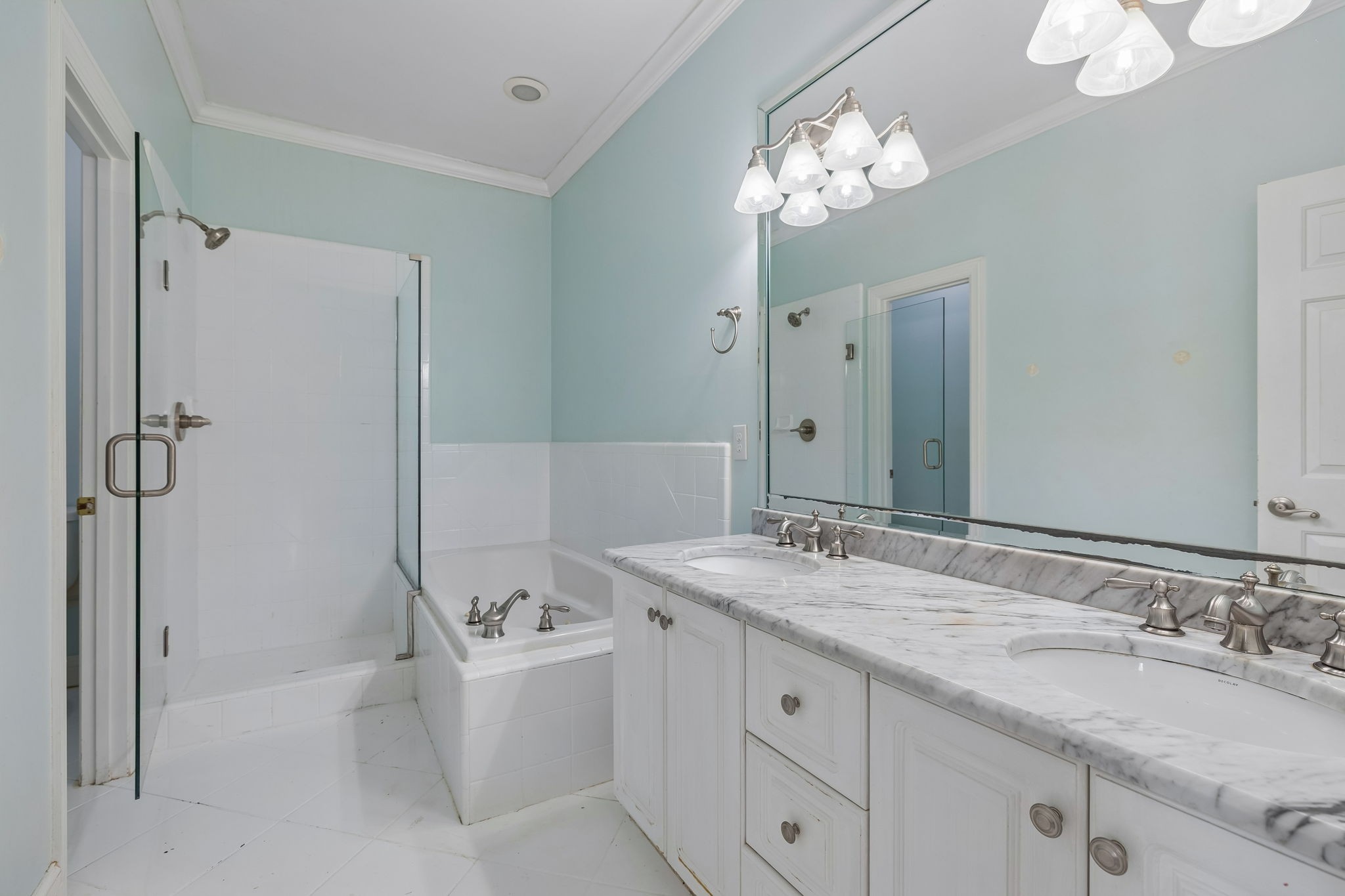 230 Harding Place Nashville, TN 37205 - Photo 30 of 54 a bathroom with a granite countertop sink a large mirror and shower