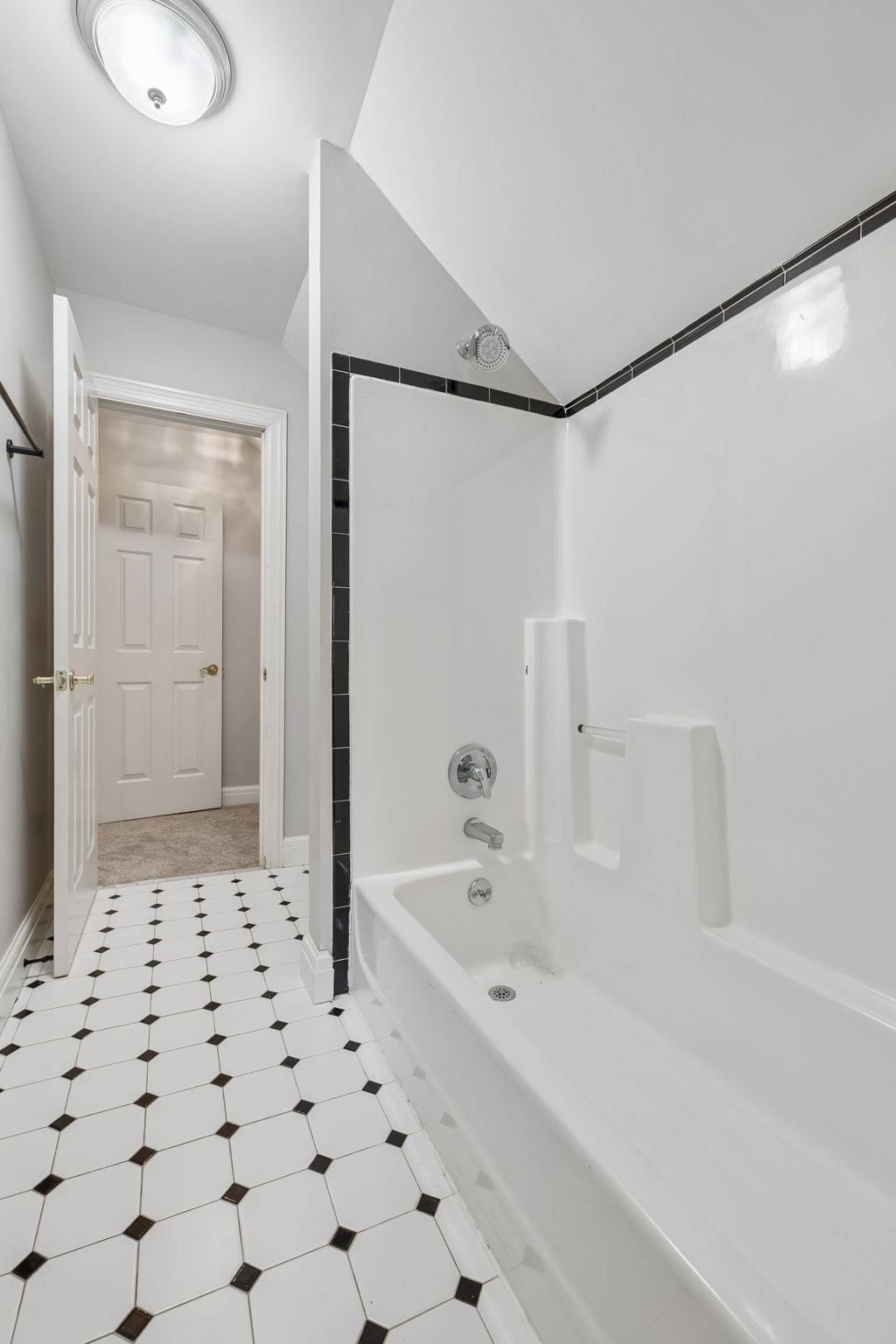 230 Harding Place Nashville, TN 37205 - Photo 37 of 54 a bathroom with a bathtub and shower