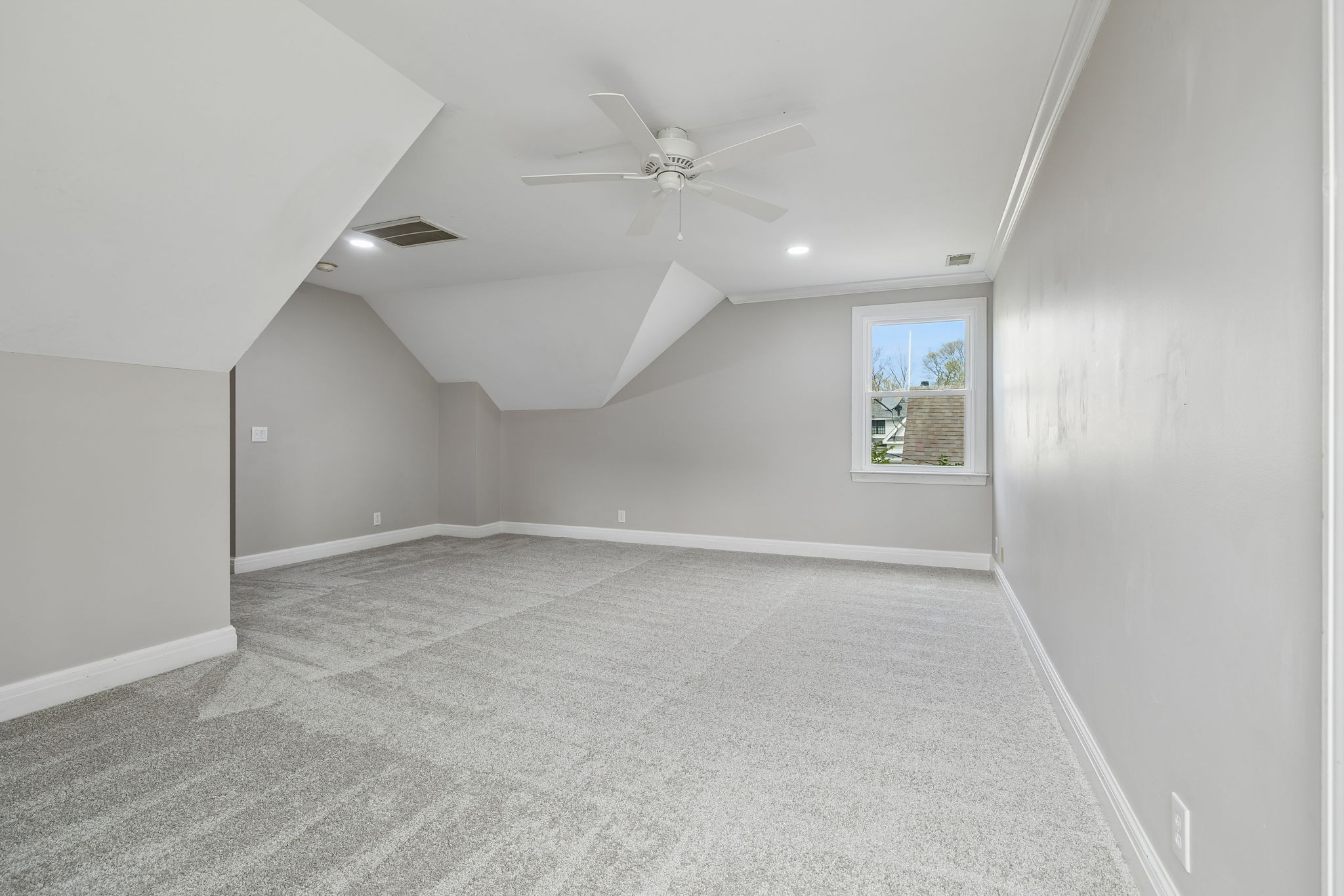 230 Harding Place Nashville, TN 37205 - Photo 44 of 54 an empty room with a ceiling fan and a window