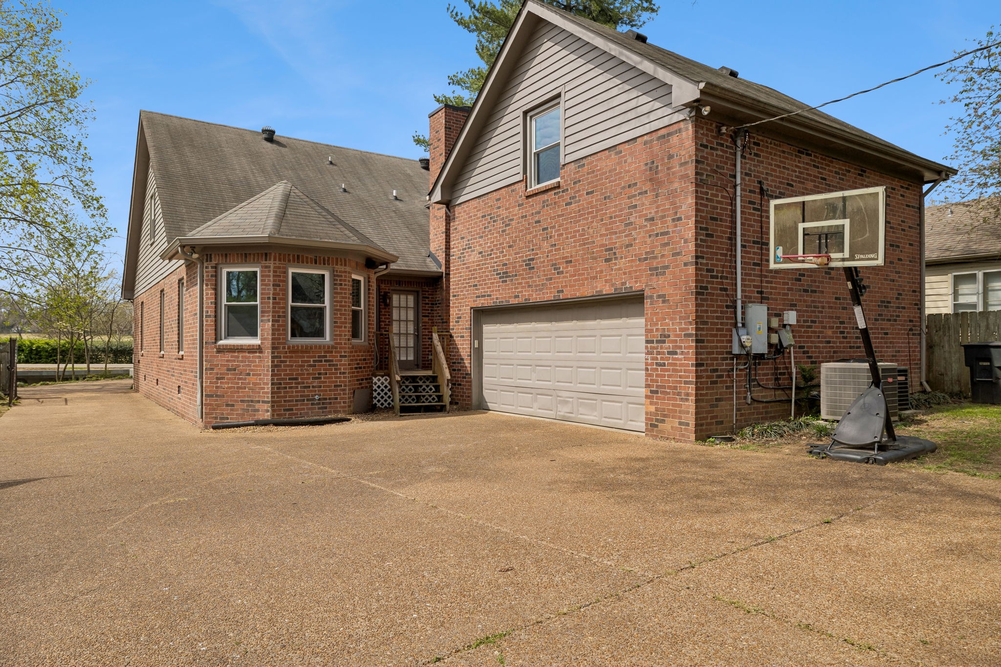 230 Harding Place Nashville, TN 37205 - Photo 50 of 54 a front view of a house with garage