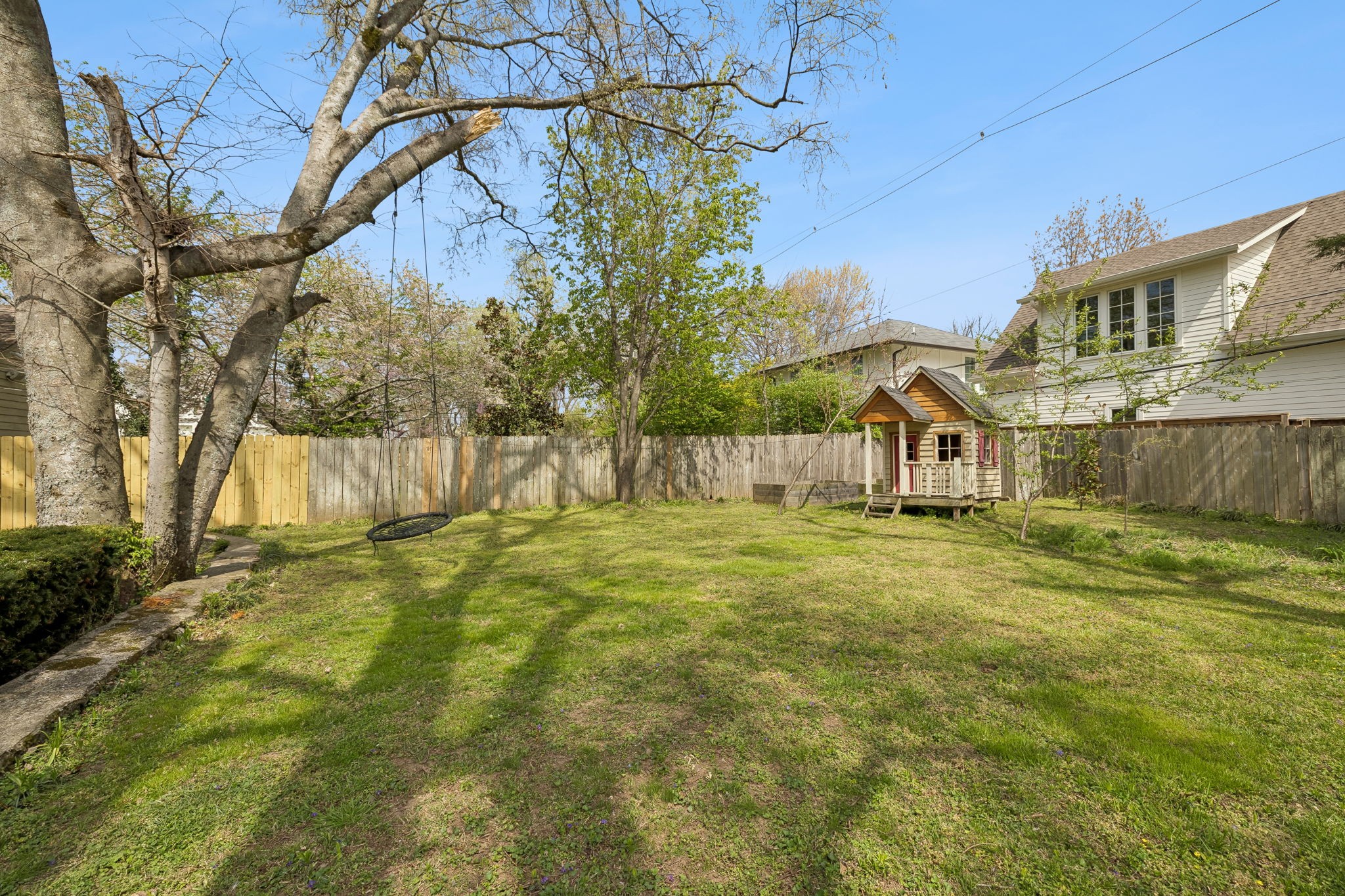 230 Harding Place Nashville, TN 37205 - Photo 52 of 54 a view of a house with a yard