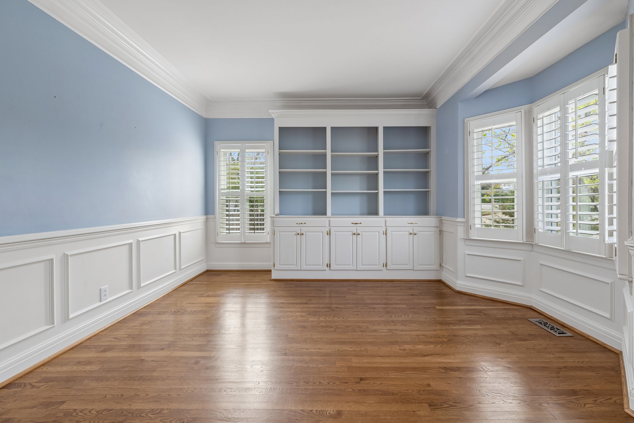 230 Harding Place Nashville, TN 37205 - Photo 7 of 54 wooden floor in an empty room with a window