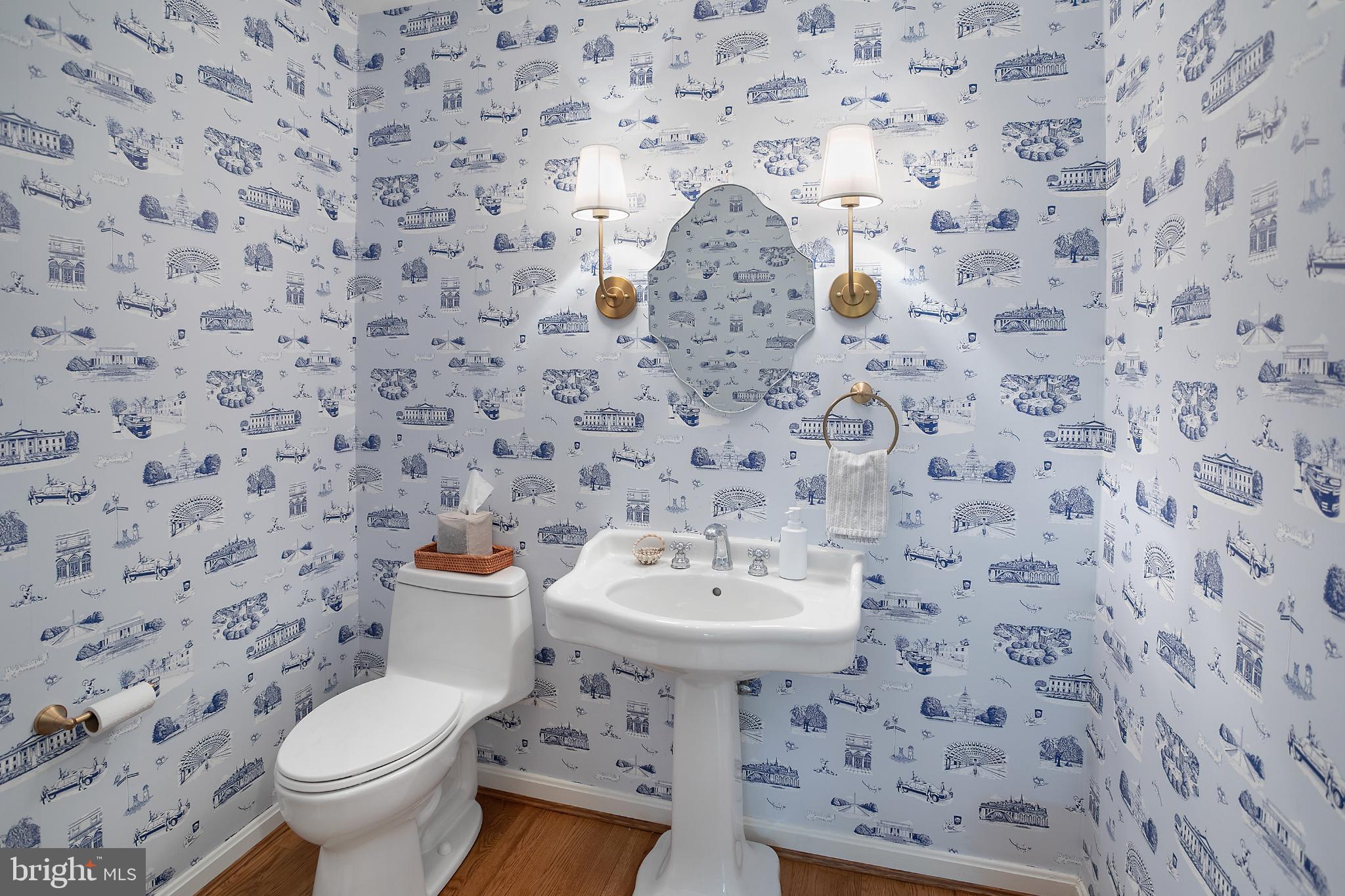 1212 Old Stable Road McLean, VA 22102 - Photo 13 of 33 a bathroom with a sink a toilet and a mirror