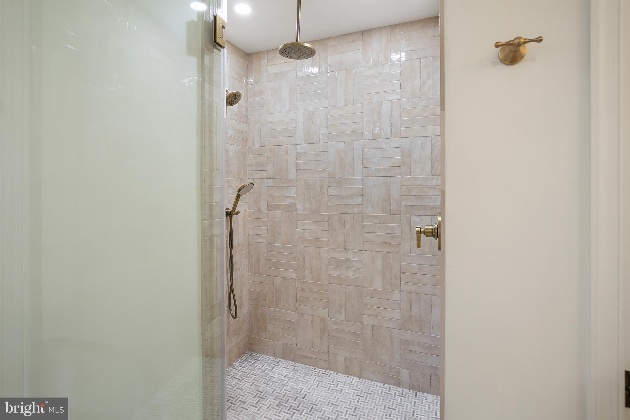 1212 Old Stable Road McLean, VA 22102 - Photo 18 of 33 a bathroom with a shower