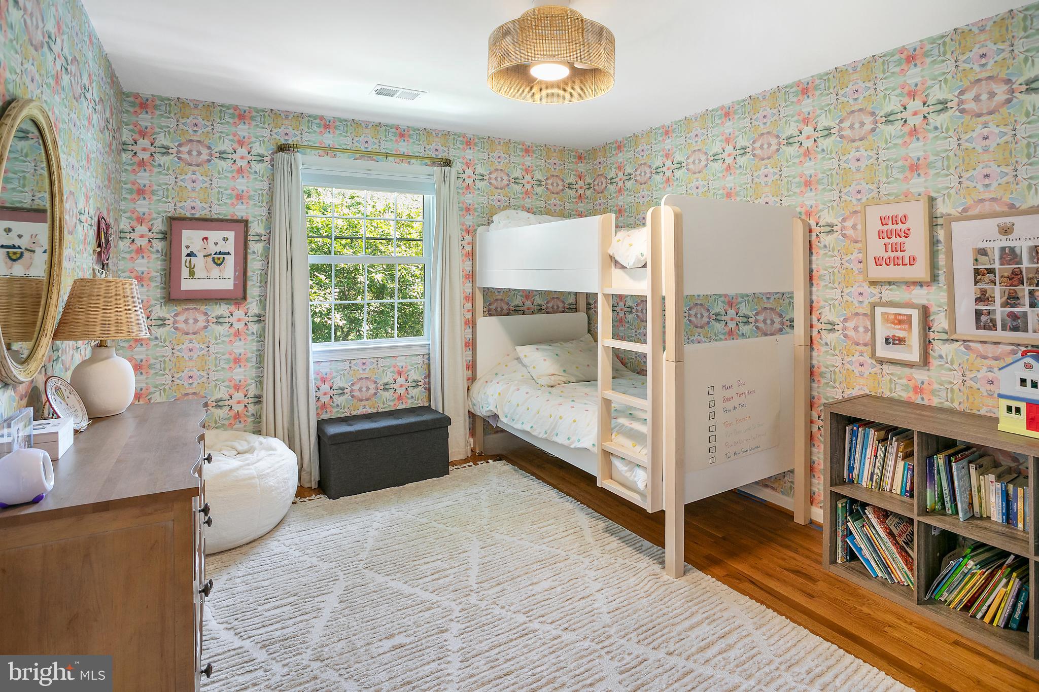 1212 Old Stable Road McLean, VA 22102 - Photo 21 of 33 a bedroom with furniture and a book shelf