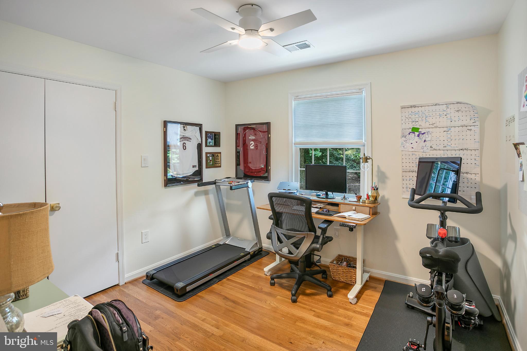 1212 Old Stable Road McLean, VA 22102 - Photo 24 of 33 a view of a workspace with furniture and a livingroom
