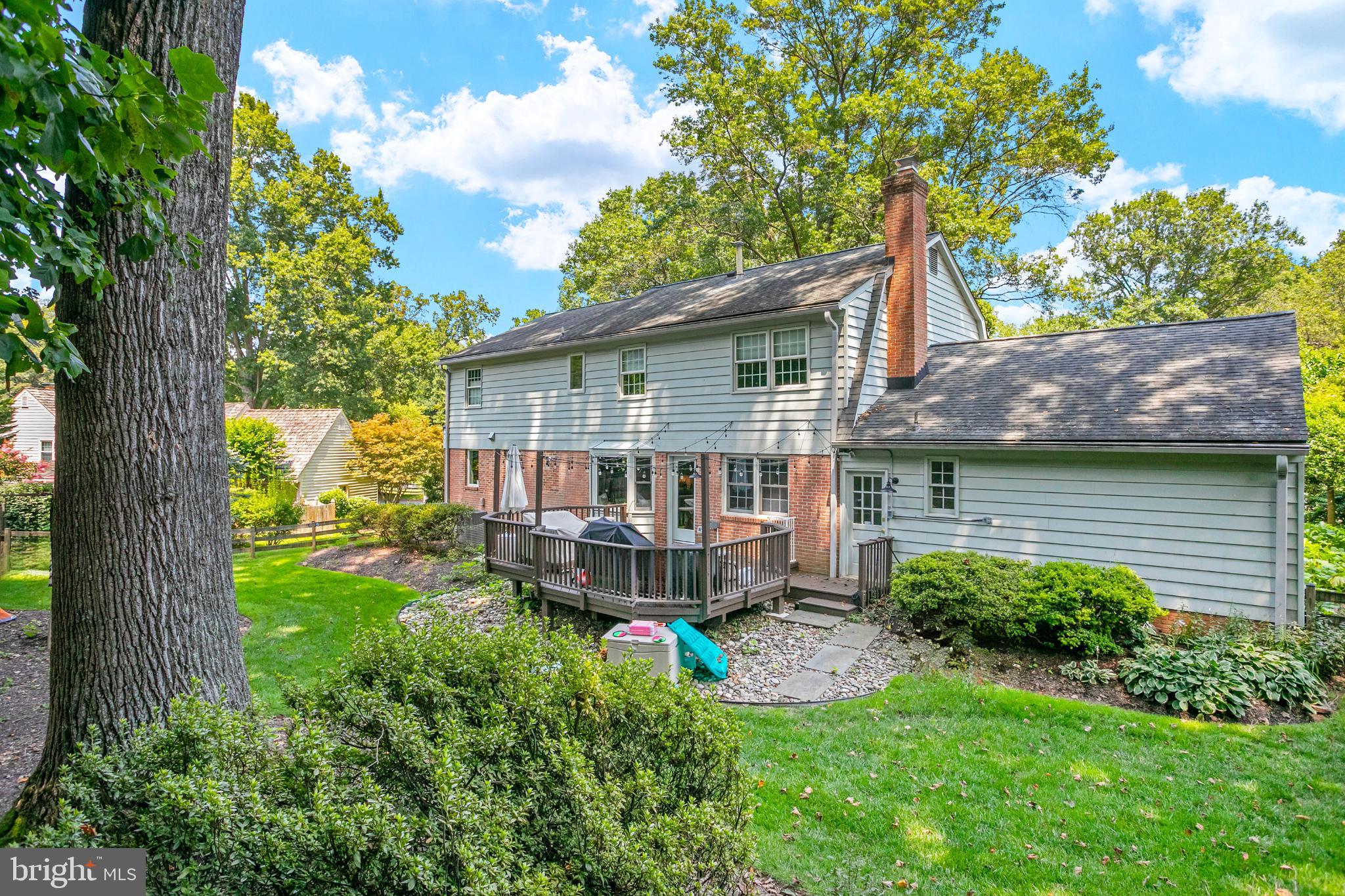 1212 Old Stable Road McLean, VA 22102 - Photo 30 of 33 a view of a house with a backyard and a patio
