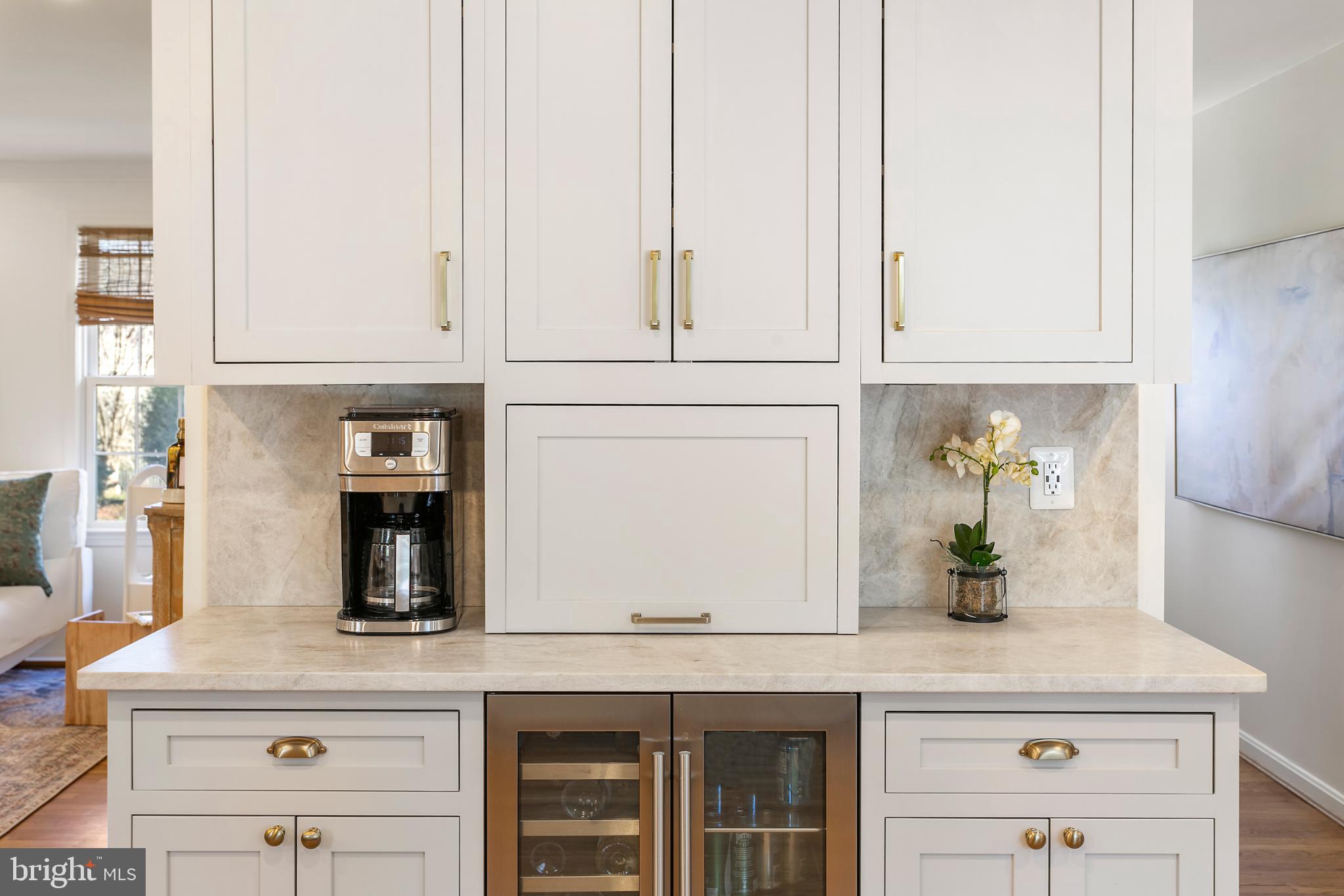 1212 Old Stable Road McLean, VA 22102 - Photo 9 of 33 a kitchen with appliances cabinets and a counter top space