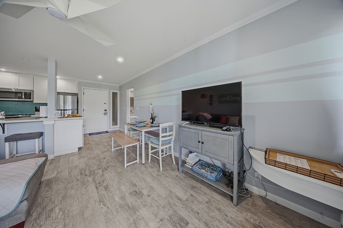 525 Aleka Loop, Unit J2 Kapaa, HI 96746 - Photo 12 of 30 a living room with furniture and a flat screen tv