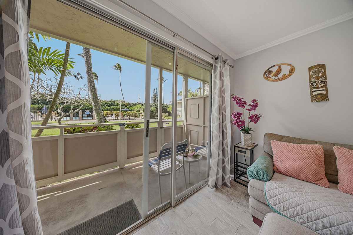 525 Aleka Loop, Unit J2 Kapaa, HI 96746 - Photo 13 of 30 a living room with a large window