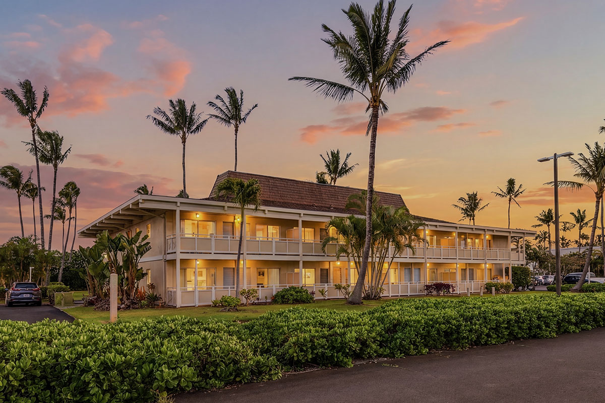 525 Aleka Loop, Unit J2 Kapaa, HI 96746 - Photo 21 of 30 a front view of a house with a yard and palm trees