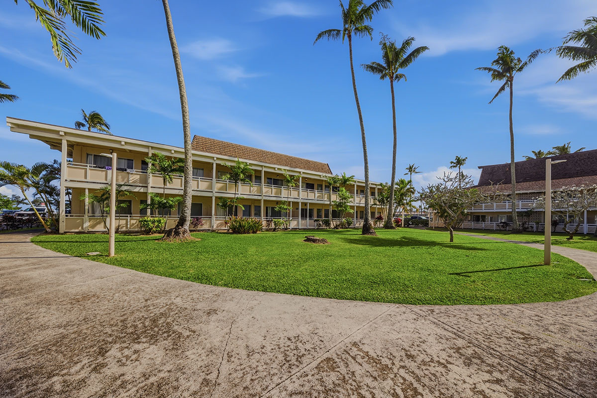 525 Aleka Loop, Unit J2 Kapaa, HI 96746 - Photo 24 of 30 a view of a garden with a large tree