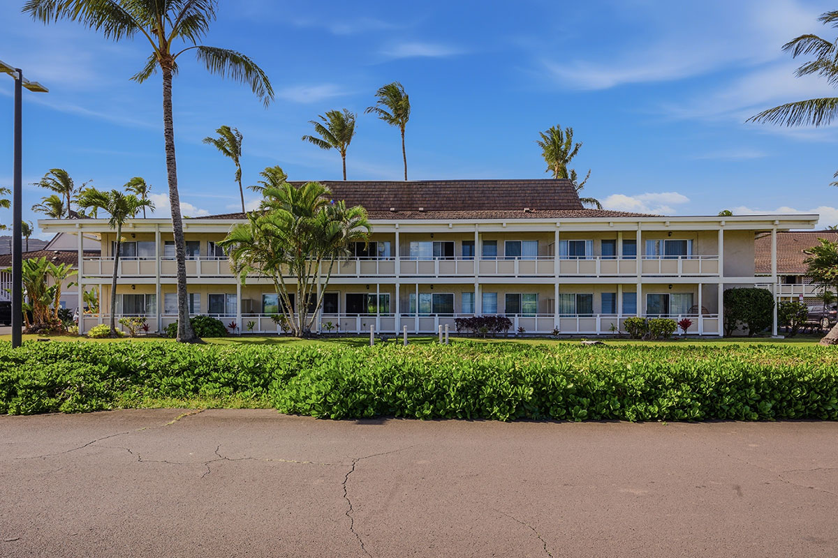 525 Aleka Loop, Unit J2 Kapaa, HI 96746 - Photo 29 of 30 a front view of a building with potted plants