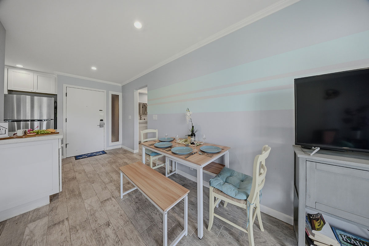 525 Aleka Loop, Unit J2 Kapaa, HI 96746 - Photo 7 of 30 a view of a livingroom with furniture and a flat screen tv