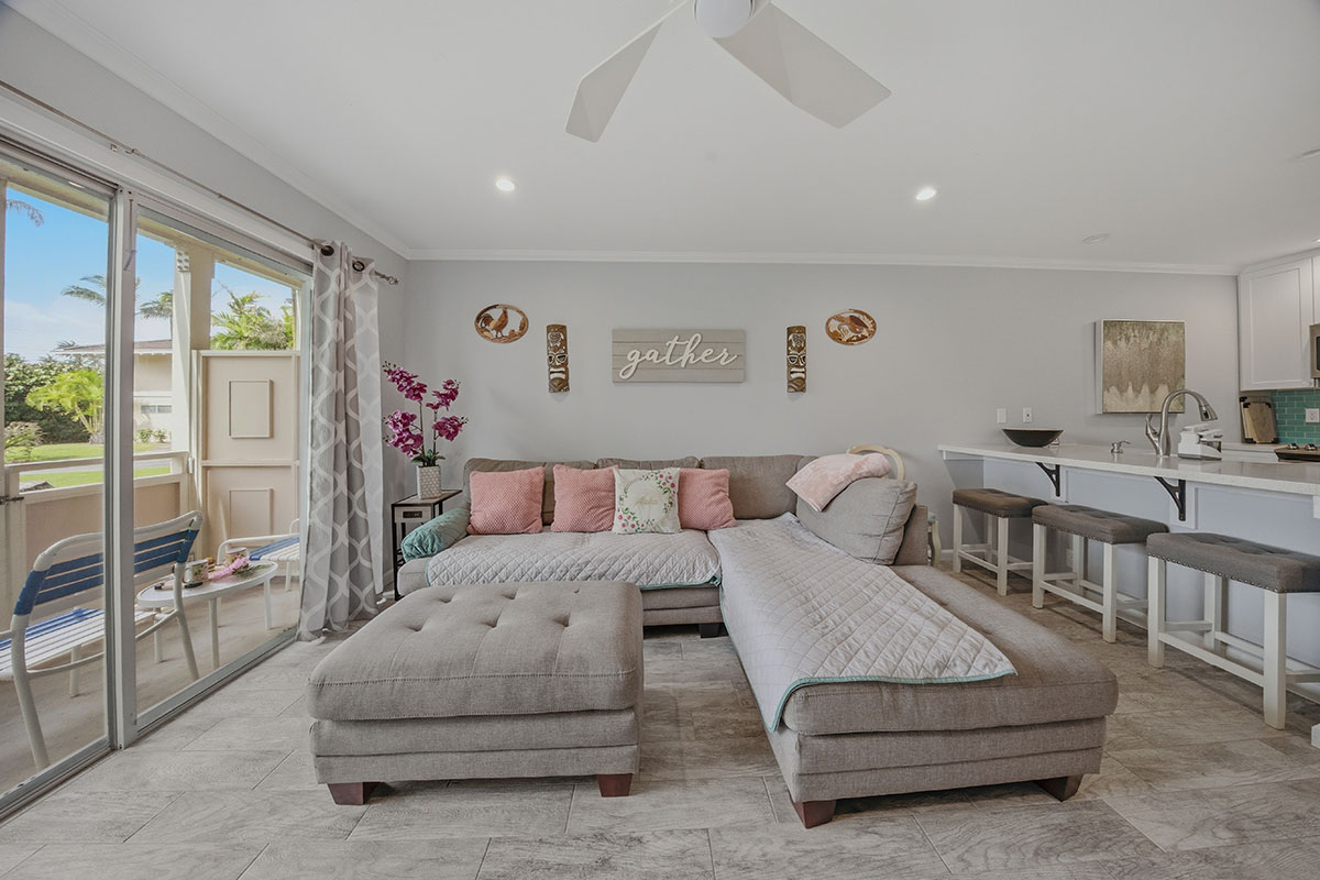 525 Aleka Loop, Unit J2 Kapaa, HI 96746 - Photo 10 of 30 a bedroom with furniture and a large window