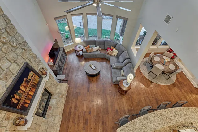 a view of a swimming pool with an outdoor seating
