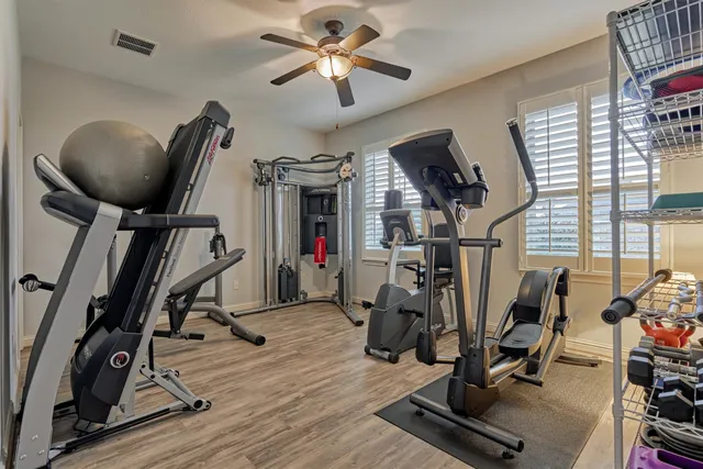 a view of a swimming pool with a lounge chairs