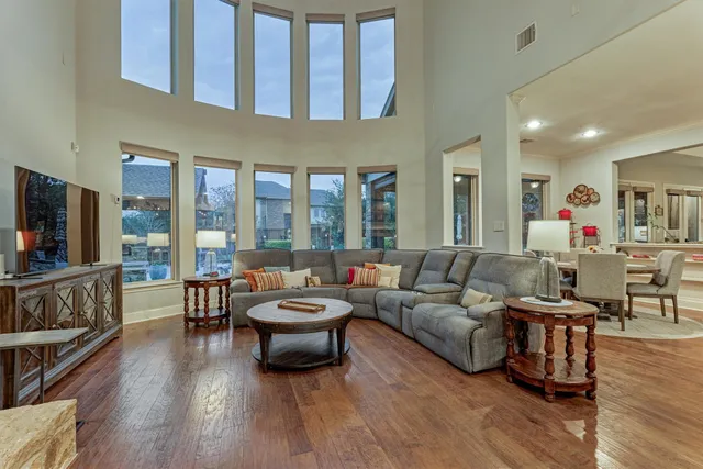 a kitchen with center island a sink stainless steel appliances and cabinets