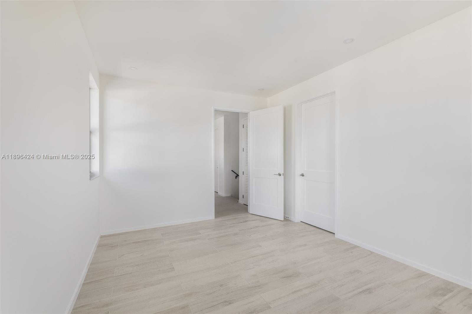 7498 Southwest 100th Street, Unit 8 Pinecrest, FL 33156 - Photo 25 of 61 a view of an empty room