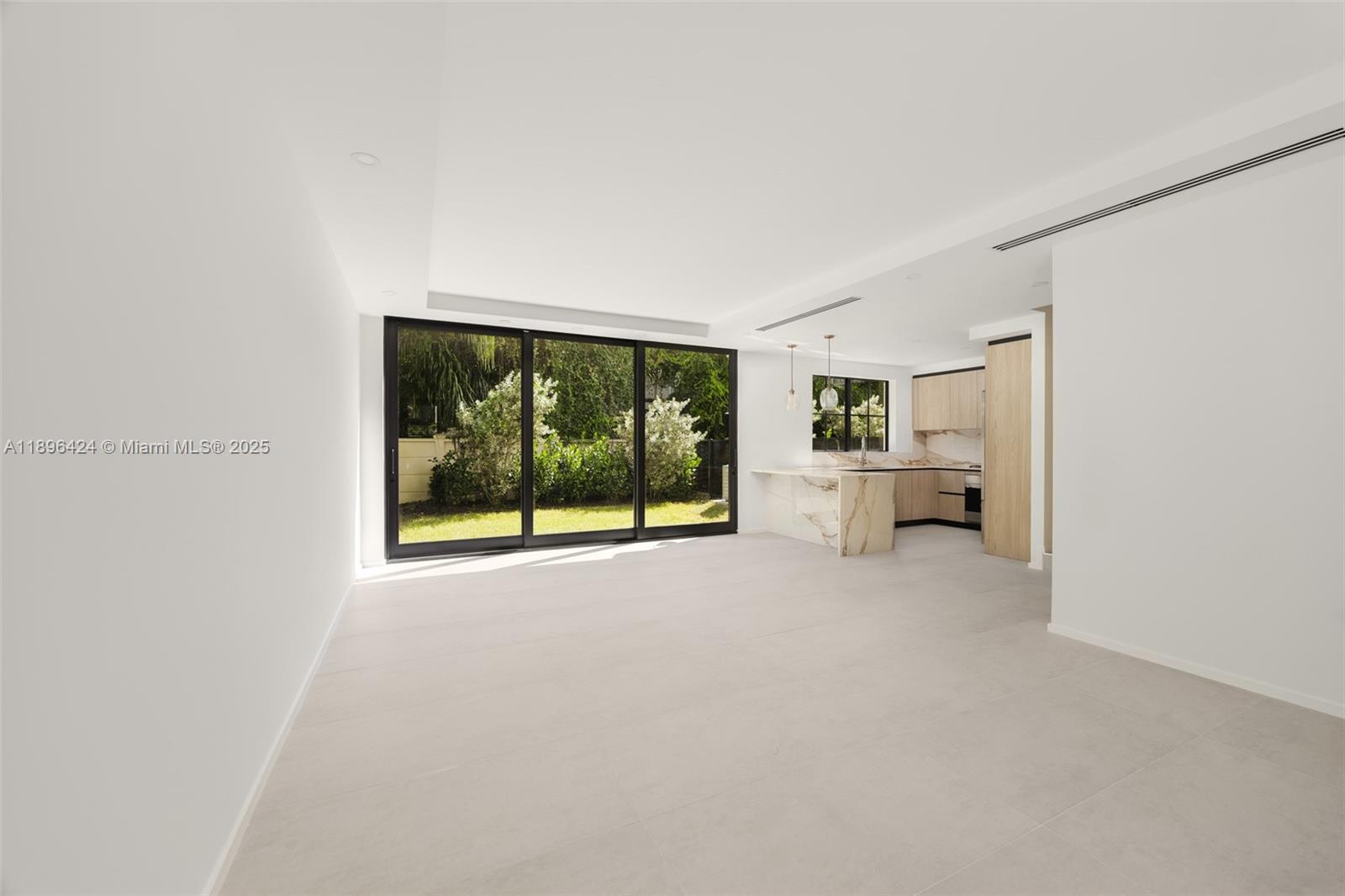 7498 Southwest 100th Street, Unit 8 Pinecrest, FL 33156 - Photo 3 of 61 a area with a large window