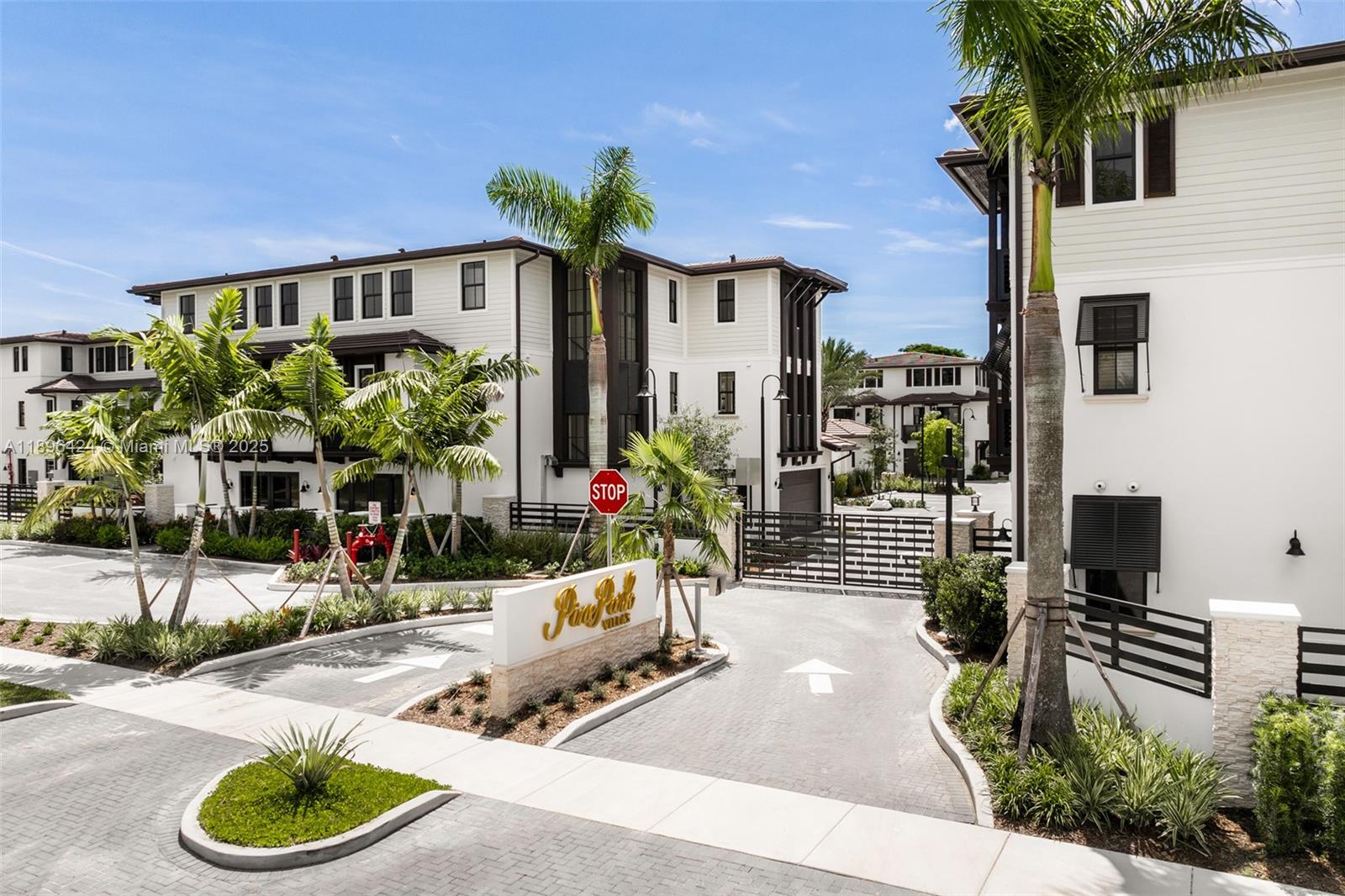 7498 Southwest 100th Street, Unit 8 Pinecrest, FL 33156 - Photo 45 of 61 a front view of a house with garden