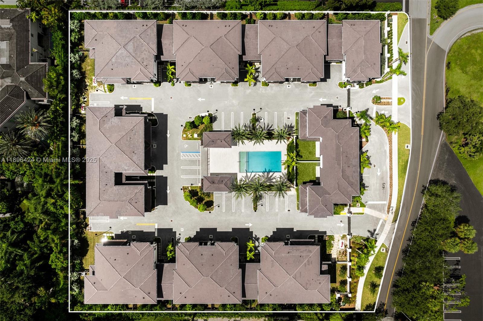 7498 Southwest 100th Street, Unit 8 Pinecrest, FL 33156 - Photo 48 of 61 an aerial view of residential houses with outdoor space