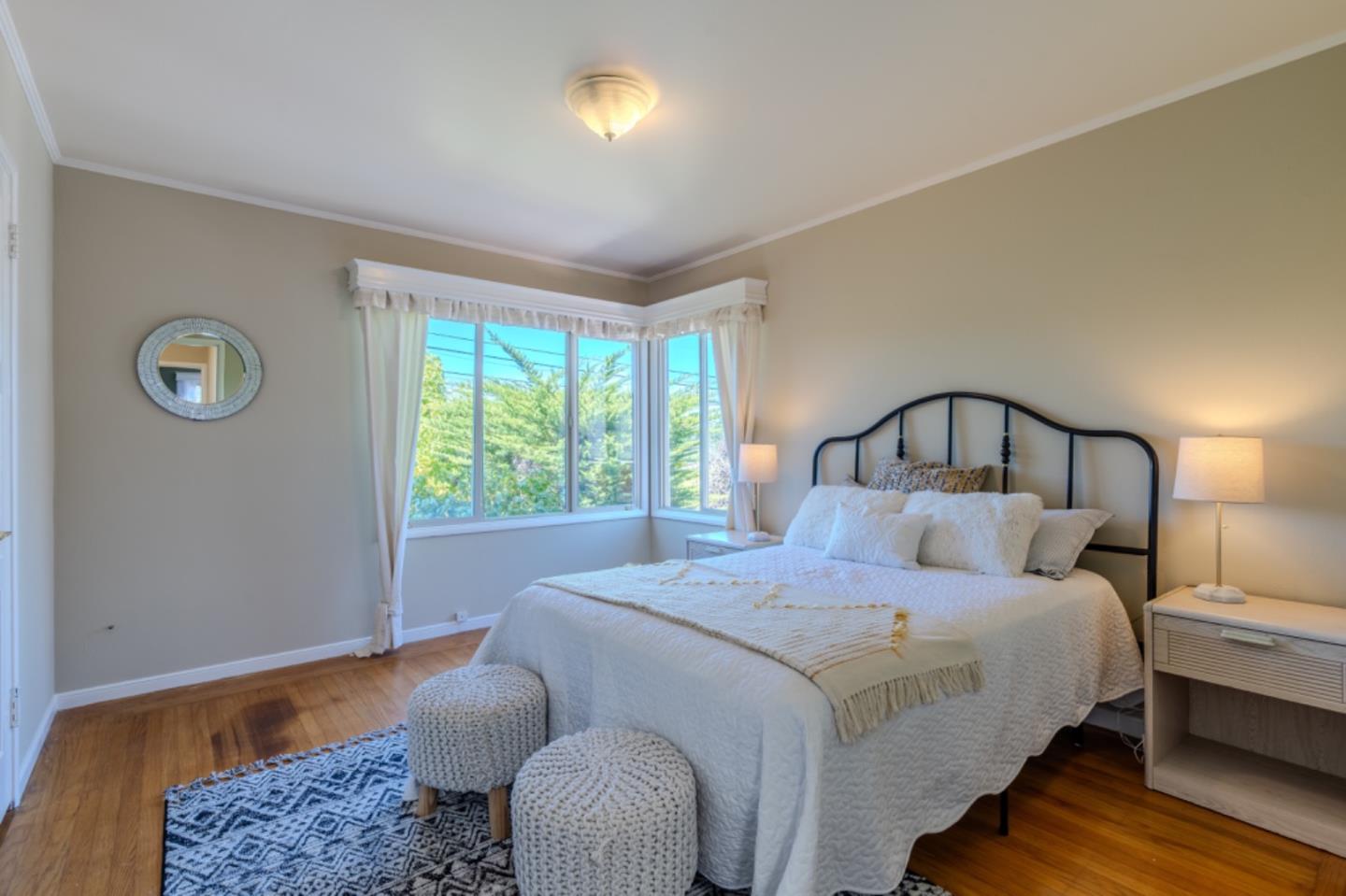 67 Cliffside Drive Daly City, CA 94015 - Photo 17 of 37 a bedroom with a bed window and a couch