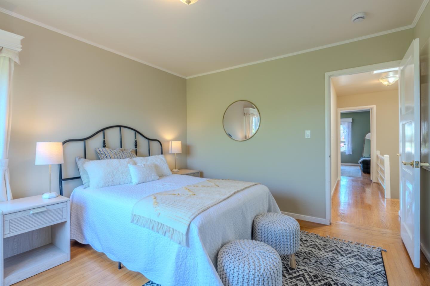 67 Cliffside Drive Daly City, CA 94015 - Photo 18 of 37 a bedroom with a bed and wooden floor