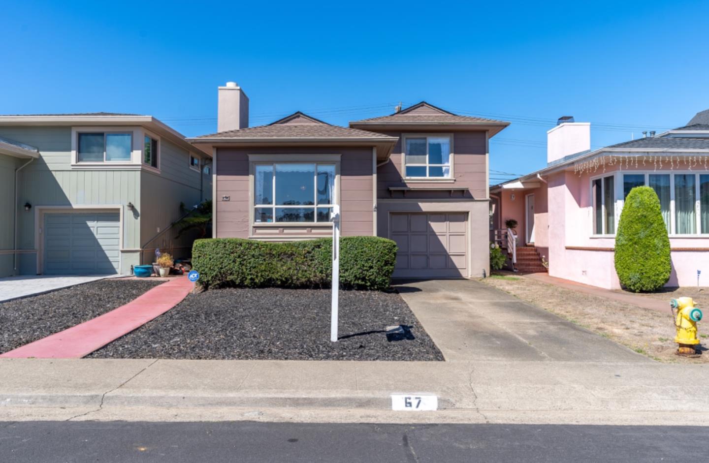 67 Cliffside Drive Daly City, CA 94015 - Photo 2 of 37 a front view of a house with garden