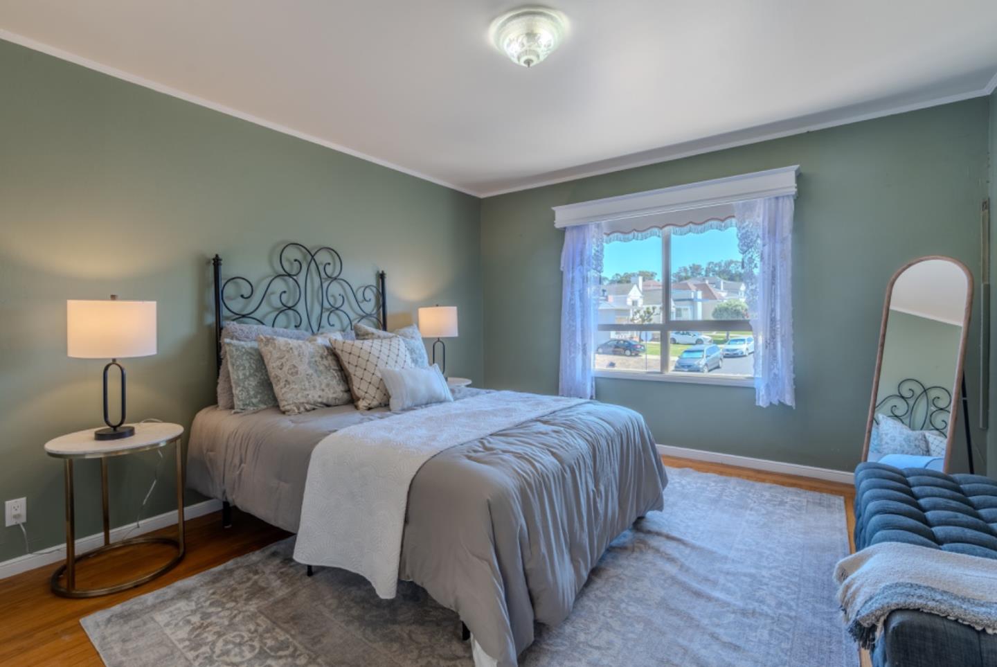 67 Cliffside Drive Daly City, CA 94015 - Photo 22 of 37 a bedroom with a bed and wooden floor