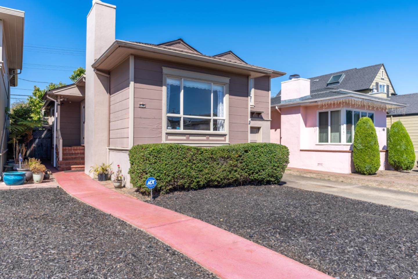 67 Cliffside Drive Daly City, CA 94015 - Photo 3 of 37 a front view of a house with a yard