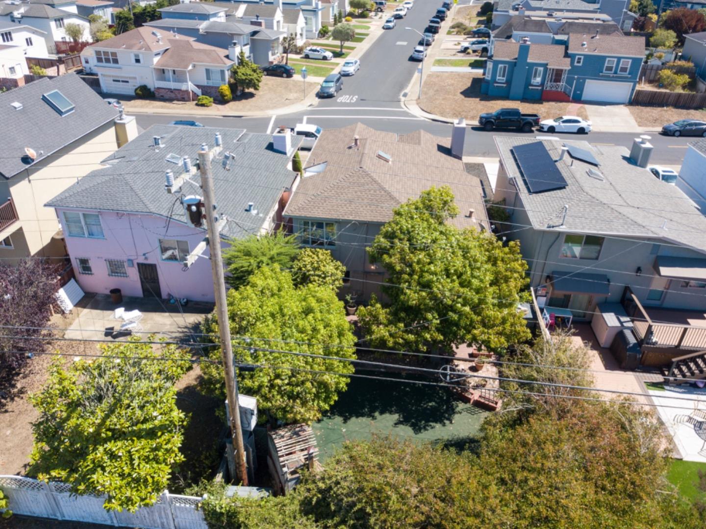 67 Cliffside Drive Daly City, CA 94015 - Photo 32 of 37 an aerial view of a house with a yard and garden