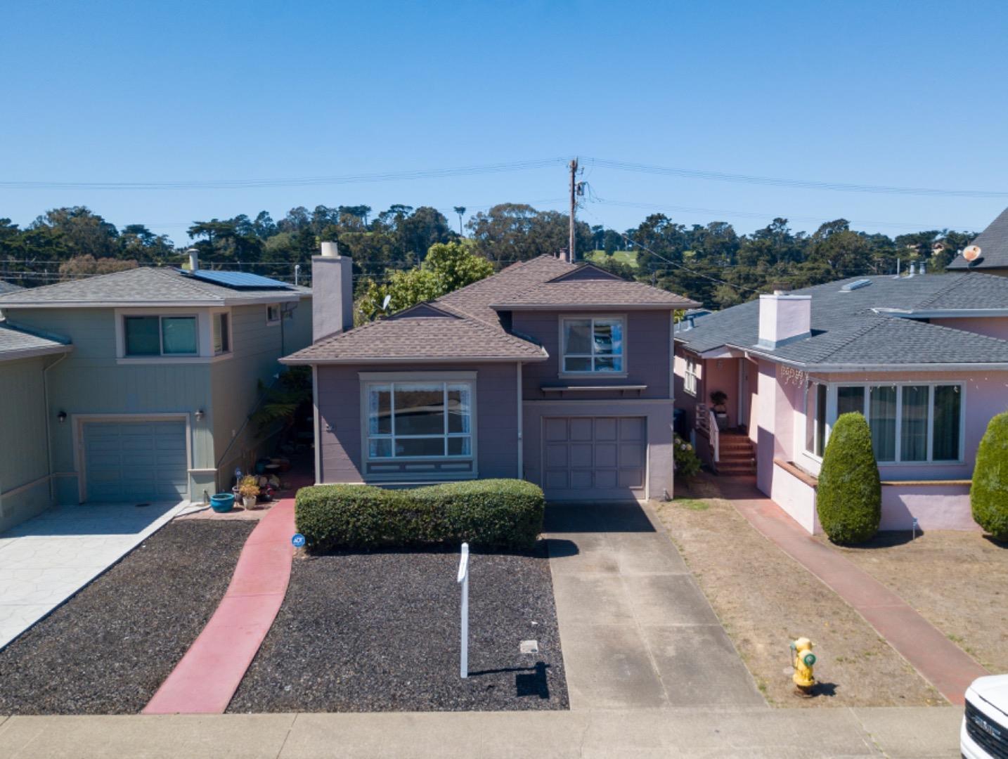 67 Cliffside Drive Daly City, CA 94015 - Photo 33 of 37 a front view of a house with garden