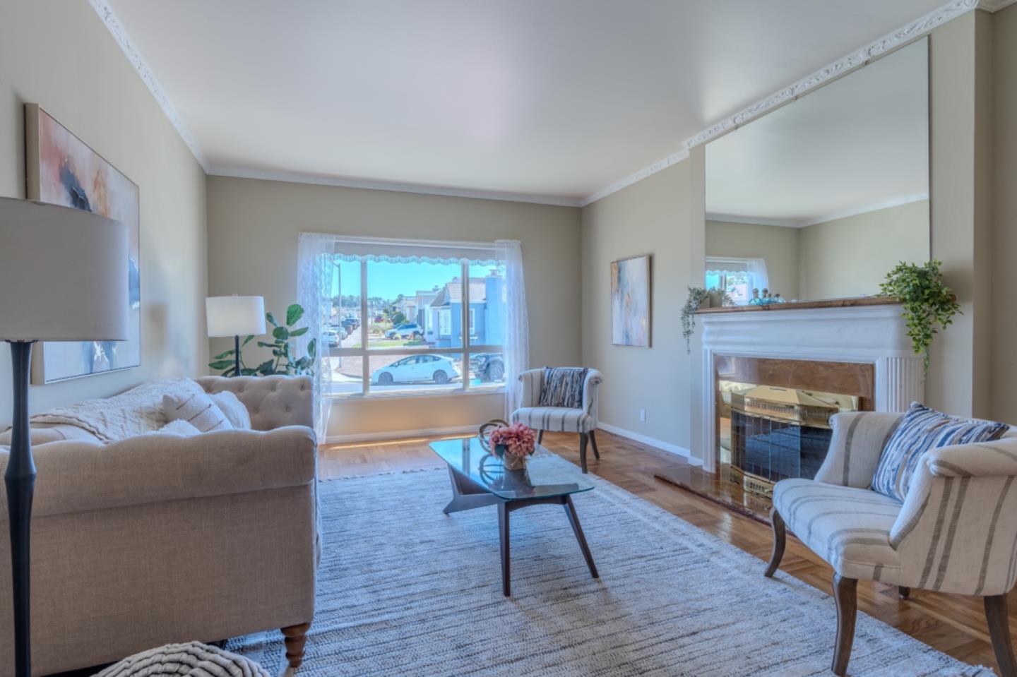 67 Cliffside Drive Daly City, CA 94015 - Photo 5 of 37 a living room with furniture and a fireplace