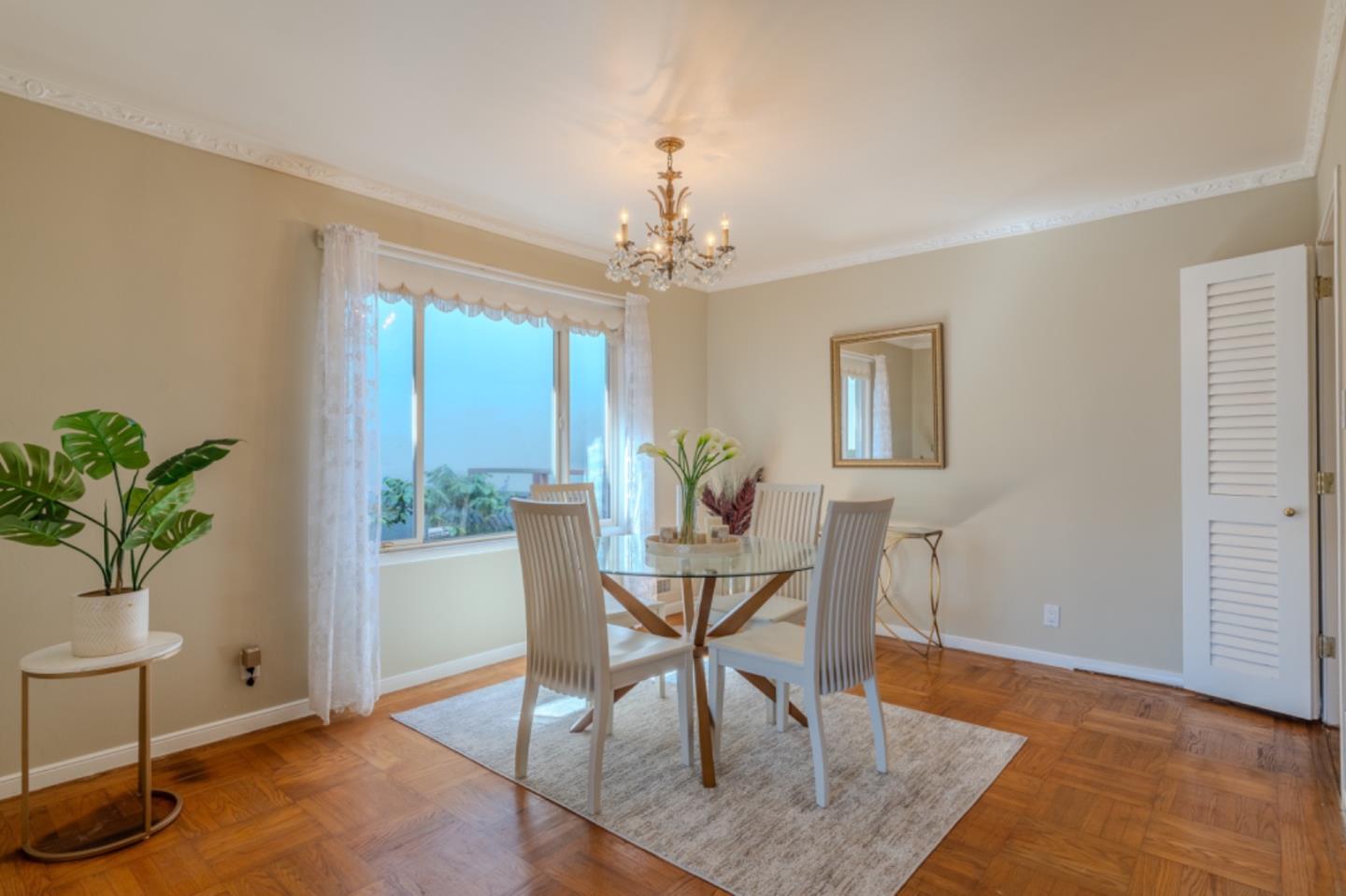 67 Cliffside Drive Daly City, CA 94015 - Photo 9 of 37 a view of a dining room with furniture and a window