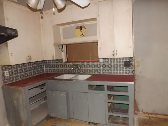 a white building with a large window