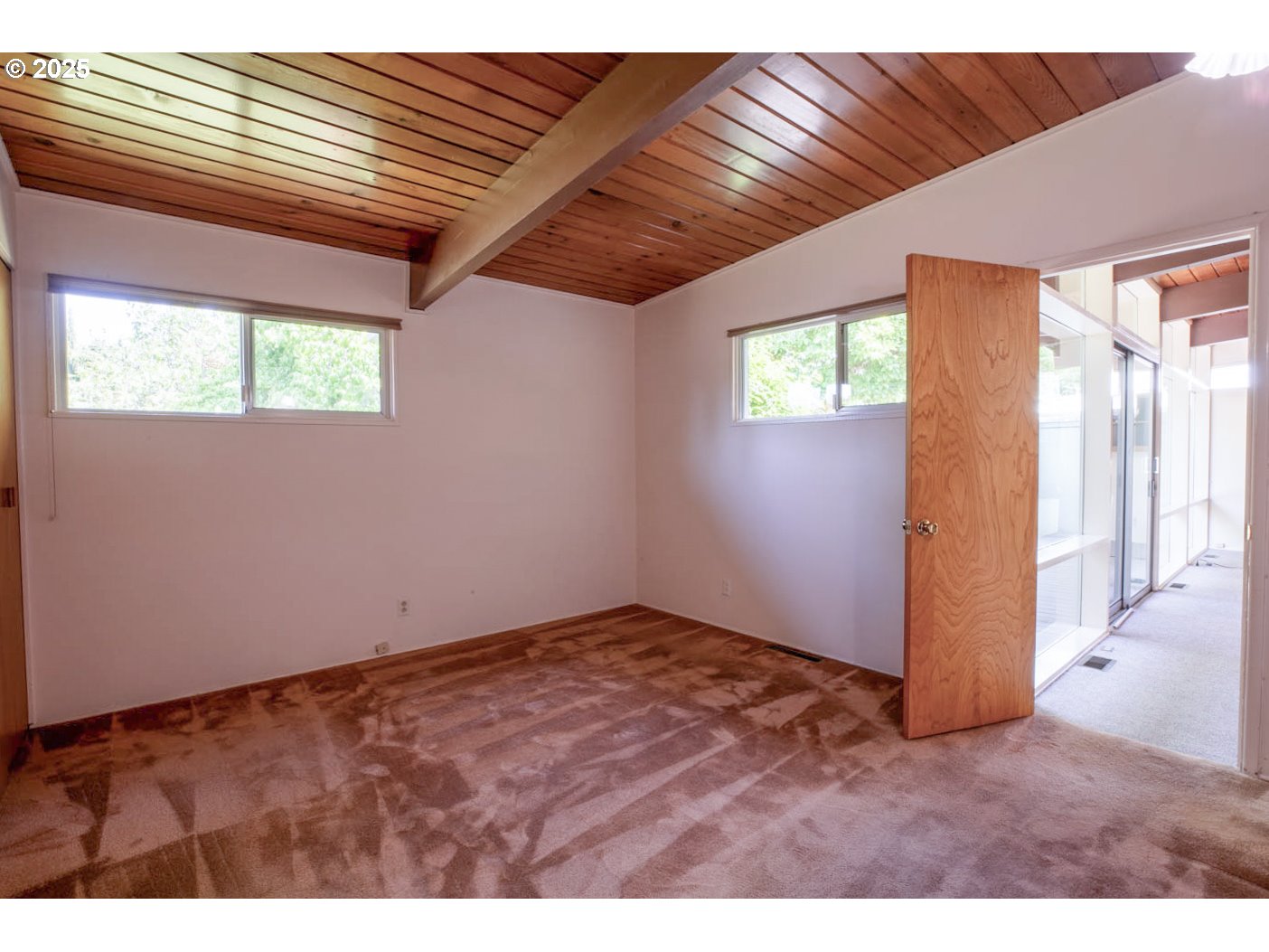 1439 Barton Street Eugene, OR 97404 - Photo 18 of 30 a view of an empty room with a window
